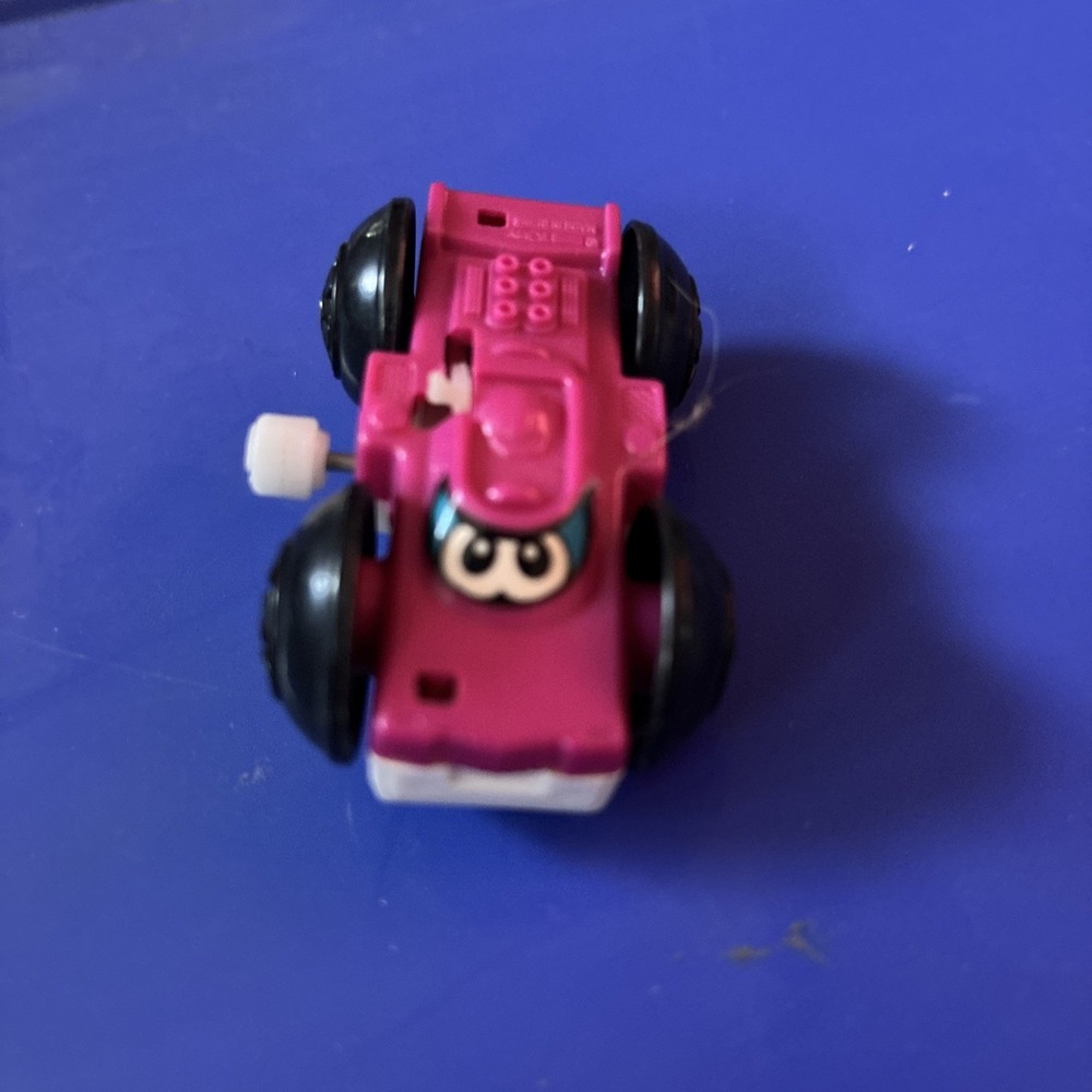 Vintage Tomy Flip Floppers wind up race car